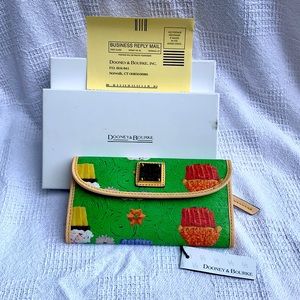 Dooney & Bourke Wallet. Green cupcake pattern